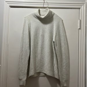 Kuhl cream turtle neck sweater never been worn size medium